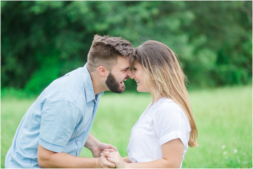 An engagement session in a grassy field in Wauchula, Florida.